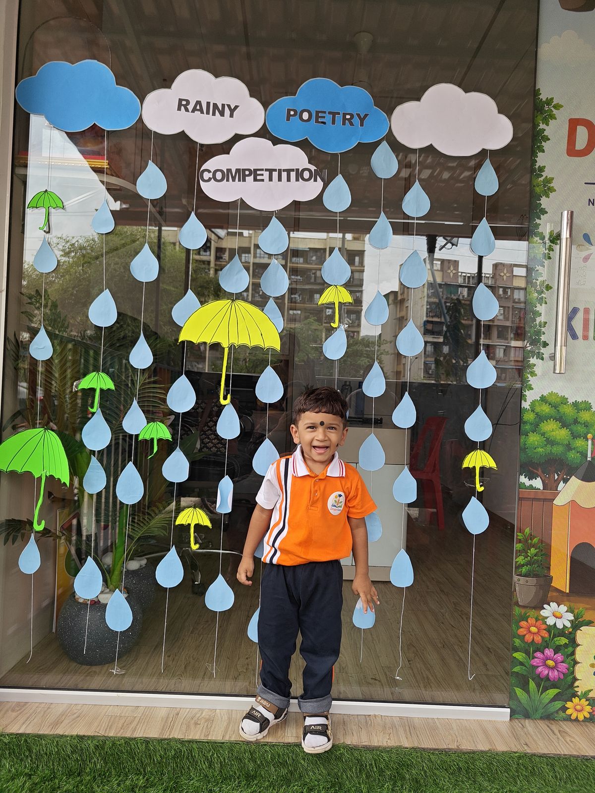Rainy Poetry — clouds and paper rain in the front window.
